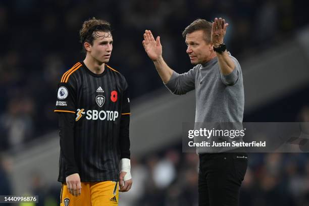 Jesse Marsch speaks to Brenden Aaronson of Leeds United after their sides defeat during the Premier League match between Tottenham Hotspur and Leeds...