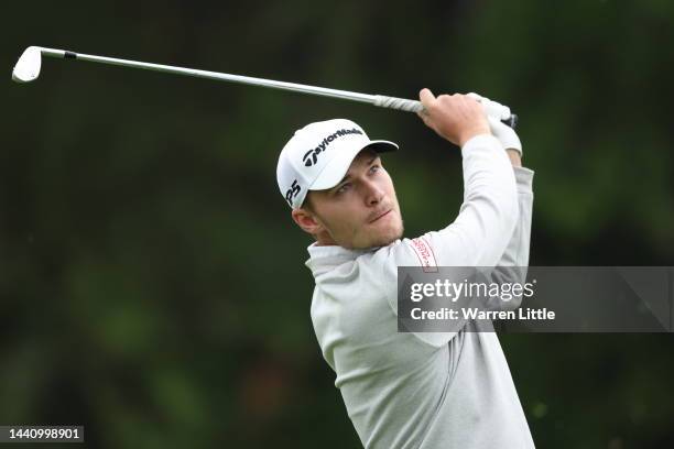 Rasmus Hojgaard of Denmark plays his second shot on the eighth hole during completion of the weather effected second round of the Nedbank Golf...