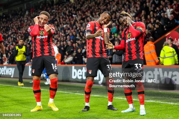 Marcus Tavernier and Jordan Zemura join in the celebrations with Jaidon Anthony of Bournemouth after he scores a goal to make it 3-0 during the...