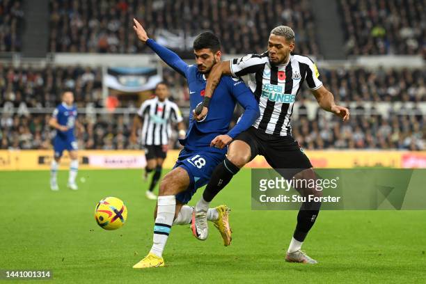Armando Broja of Chelsea battles for possession with Joelinton of Newcastle United during the Premier League match between Newcastle United and...