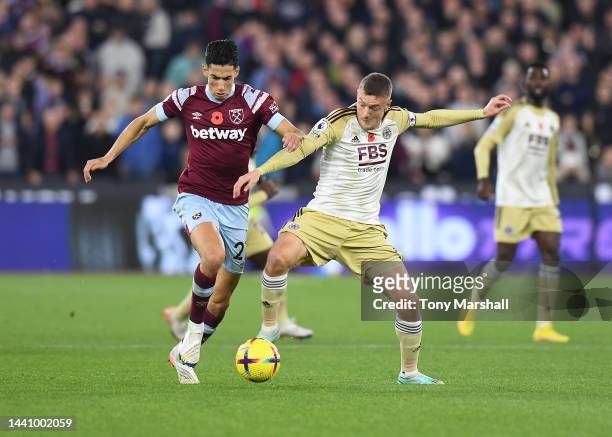 Nayef Aguerd of West Ham United is challenged by Jamie Vardy of Leicester City during the Premier League match between West Ham United and Leicester...