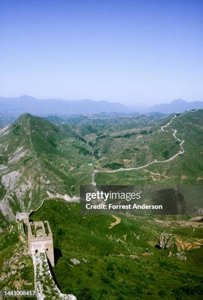 View of the Great Wall snaking across the mountains between Simatai and Gubeikou, northeast of Beijing, China, November, 1991.