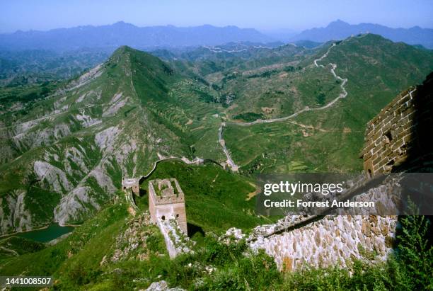 View of the Great Wall snaking across the mountains between Simatai and Gubeikou, northeast of Beijing, China, November 1991.