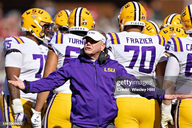 Head Coach Brian Kelly of the LSU Tigers talks to the officials in the first half of a game against the Arkansas Razorbacks at Donald W. Reynolds...