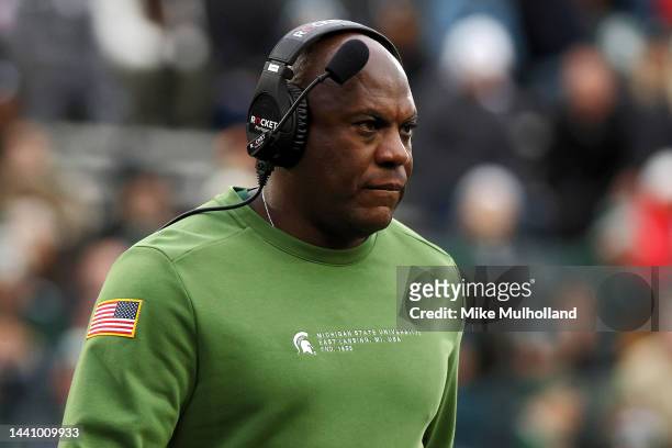 Mel Tucker coach of the Michigan State Spartans looks on in the first half of a game against the Rutgers Scarlet Knights at Spartan Stadium on...