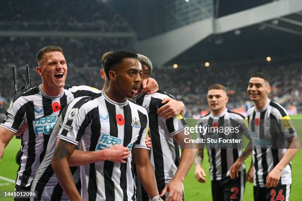 Joe Willock of Newcastle United celebrates after scoring their team's first goal during the Premier League match between Newcastle United and Chelsea...