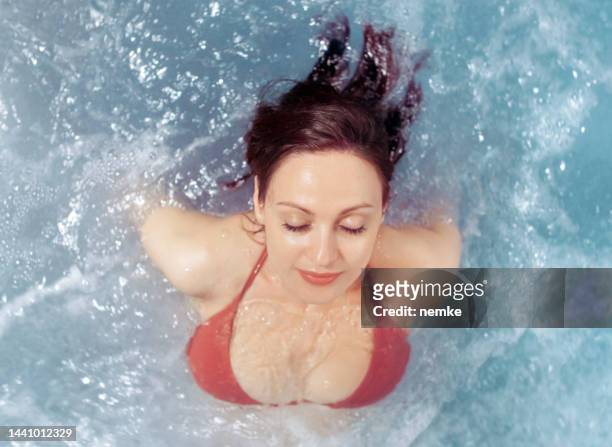 spa from above - hot women on boats stock pictures, royalty-free photos & images