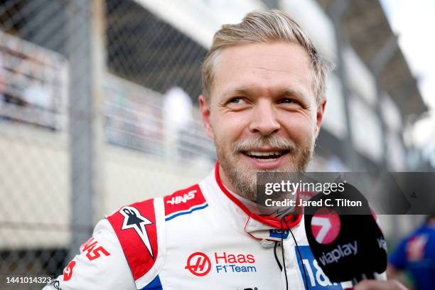 Kevin Magnussen of Denmark and Haas F1 talks to the media on the grid during the Sprint ahead of the F1 Grand Prix of Brazil at Autodromo Jose Carlos...