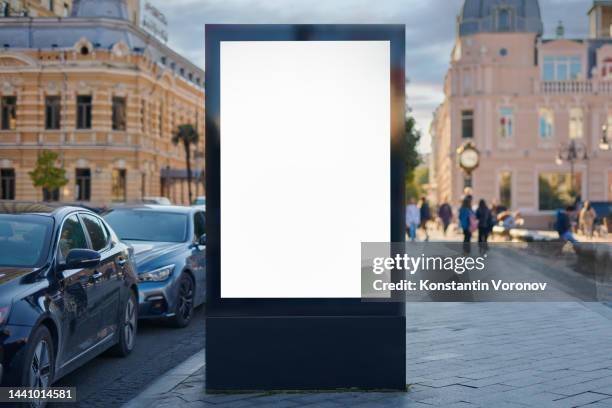 blank city format (lightposter, citylight) banner pylon on the sidewalk mockup. outdoor advertising. - insegna commerciale foto e immagini stock
