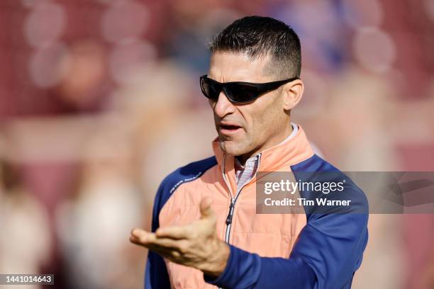 General Manager Nick Caserio watches players warm up before the game between the Texas A&M Aggies and the Florida Gators at Kyle Field on November...