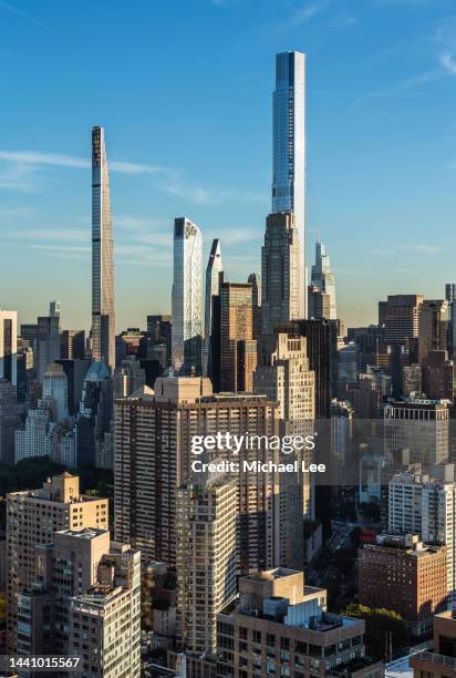 high angle view of  billionaires' row and midtown manhattan - série séquentielle photos et images de collection