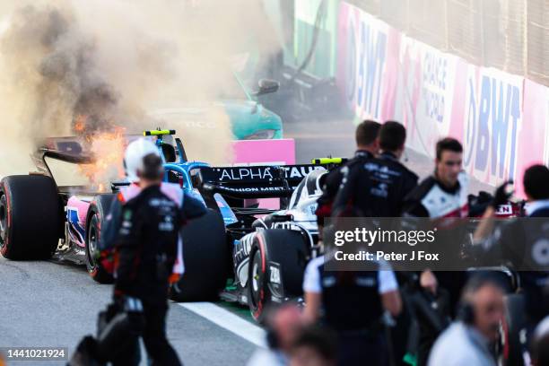 The car of Fernando Alonso of Alpine F1 and Spain catches fire after the race in parc ferme during the sprint race ahead of the F1 Grand Prix of...