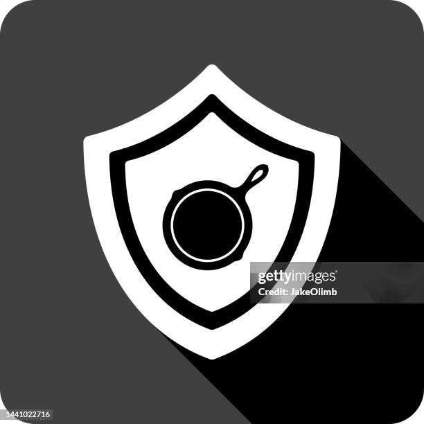shield frying skillet icon silhouette - cast iron pot stock illustrations