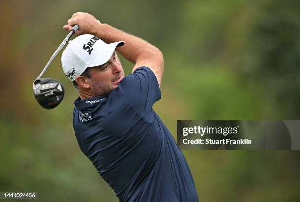 Ryan Fox of New Zealand plays his tee shot on the 11th hole during the weather delayed second round during Day Three of the Nedbank Golf Challenge at...