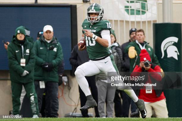Payton Thorne of the Michigan State Spartans runs up the field in the first half oa game against the Rutgers Scarlet Knights at Spartan Stadium on...