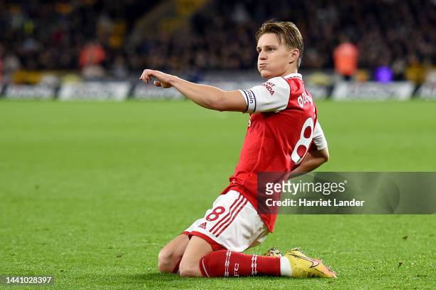 Martin Oedegaard of Arsenal celebrates after scoring their team's second goal during the Premier League match between Wolverhampton Wanderers and...