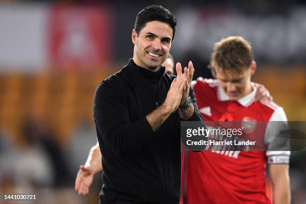 Mikel Arteta, Manager of Arsenal applauds fans following their side's victory in the Premier League match between Wolverhampton Wanderers and Arsenal...