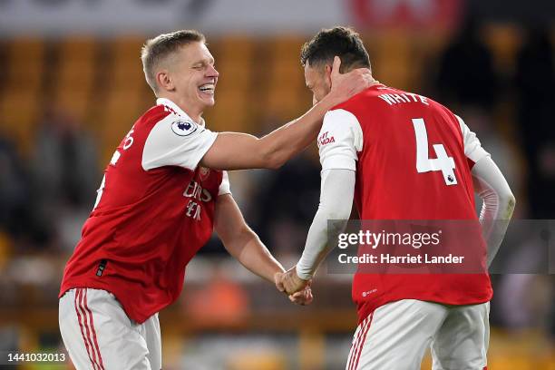 Oleksandr Zinchenko and Ben White of Arsenal interact following their side's victory in the Premier League match between Wolverhampton Wanderers and...