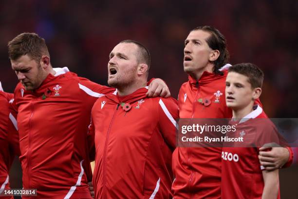 Dan Lydiate, Ken Owens and Justin Tipuric of Wales line up during the National Anthems prior to kick off of the Autumn International match between...