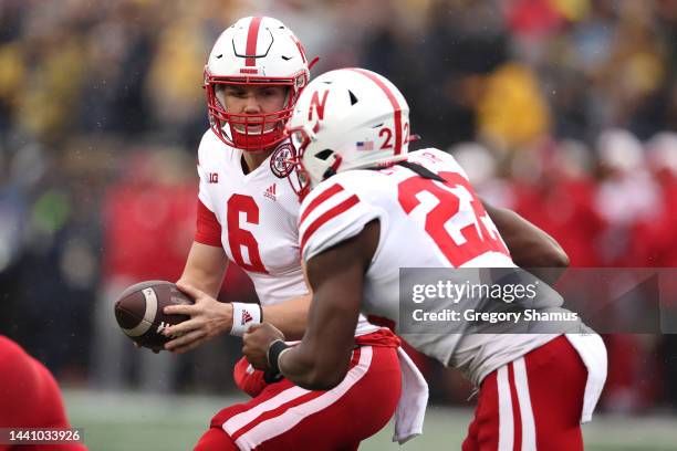 Chubba Purdy of the Nebraska Cornhuskers hands off to Gabe Ervin Jr. #22 during the first half while playing the Michigan Wolverines at Michigan...