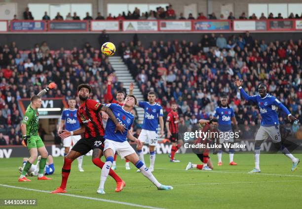 Philip Billing of AFC Bournemouth and James Tarkowski of Everton challenge for the ball during the Premier League match between AFC Bournemouth and...