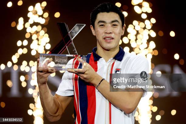 Brandon Nakashima of United States poses with the winner's trophy after defeating Jiri Lehecka of Czech Republic during the final on Day Five of the...