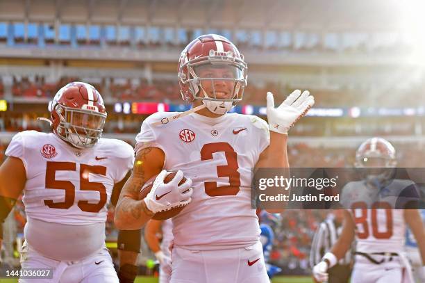 Jermaine Burton of the Alabama Crimson Tide celebrates after scoring a touchdown during the first half against the Mississippi Rebels at...