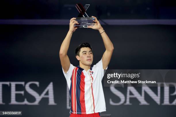 Brandon Nakashima of United States celebrates with the winner's trophy after defeating Jiri Lehecka of Czech Republic during the final on Day Five of...