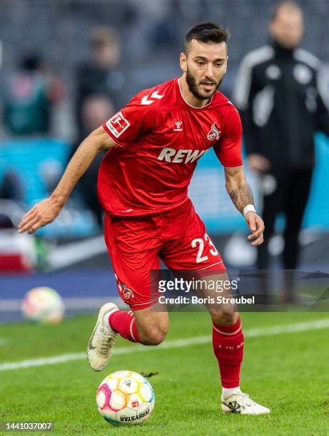 Sargis Adamyan of 1. FC Koeln runs with the ball during the Bundesliga match between Hertha BSC and 1. FC Köln at Olympiastadion on November 12, 2022...