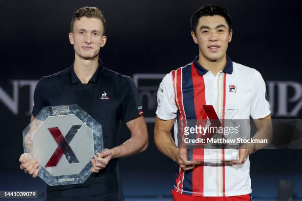 Jiri Lehecka of Czech Republic and Brandon Nakashima of United States pose with their trophies after their match during the final on Day Five of the...