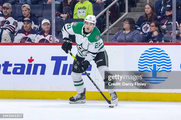 James Roderon Dallas Jason Robertson of the Dallas Stars plays the puck along the boards ...