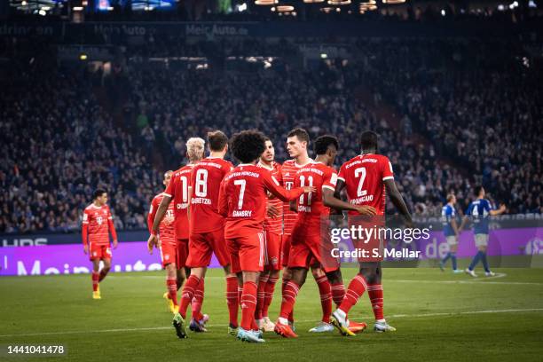 The team of FC Bayern Muenchen celebrate a goal during the Bundesliga match between FC Schalke 04 and FC Bayern München at Veltins-Arena on November...