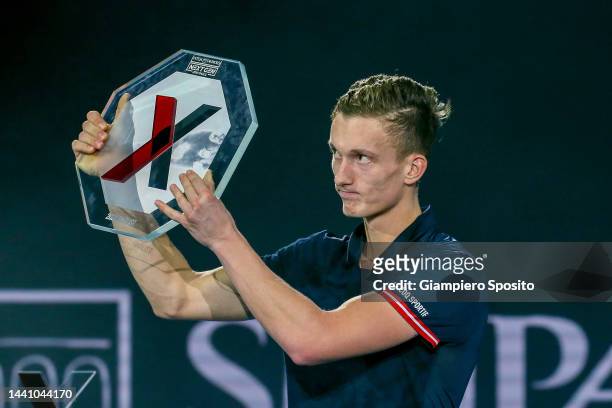 Second placed Jiri Lehecka of Czech Republic poses with trophy after the final on Day Five of the Next Gen ATP Finals at Allianz Cloud on November...