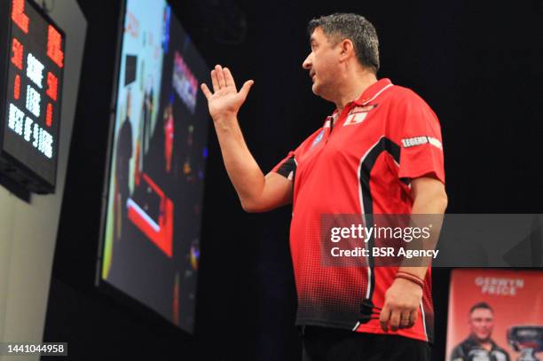 Mensur Suljovic of Austria during the Cazoo Grand Slam of Darts group match at Aldersley Leisure Village on November 12, 2022 in Wolverhampton,...