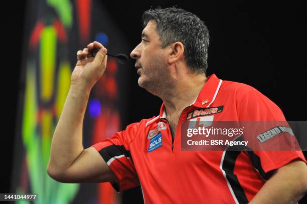 Mensur Suljovic of Austria during the Cazoo Grand Slam of Darts group match at Aldersley Leisure Village on November 12, 2022 in Wolverhampton,...