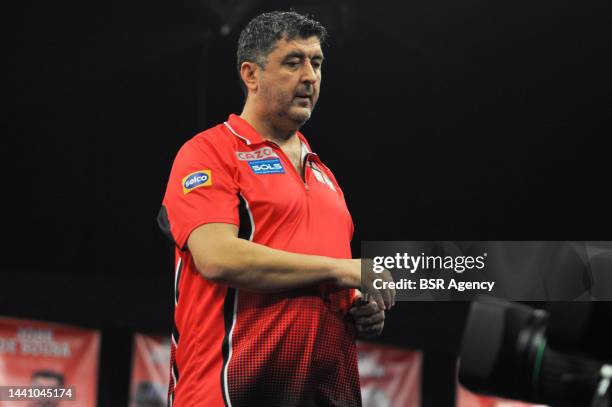 Mensur Suljovic of Austria during the Cazoo Grand Slam of Darts group match at Aldersley Leisure Village on November 12, 2022 in Wolverhampton,...