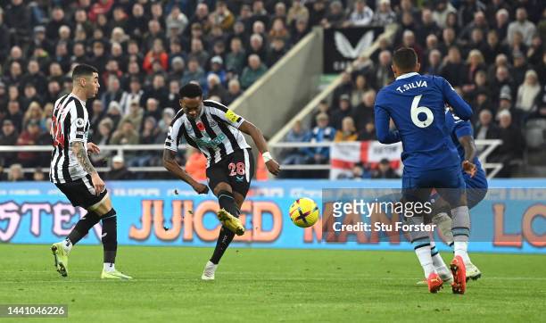 Newcastle player Joe Willock shoots to score the winning goal during the Premier League match between Newcastle United and Chelsea FC at St. James...