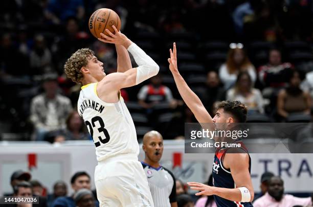 Lauri Markkanen of the Utah Jazz shoots the ball in the first quarter against Deni Avdija of the Washington Wizards at Capital One Arena on November...