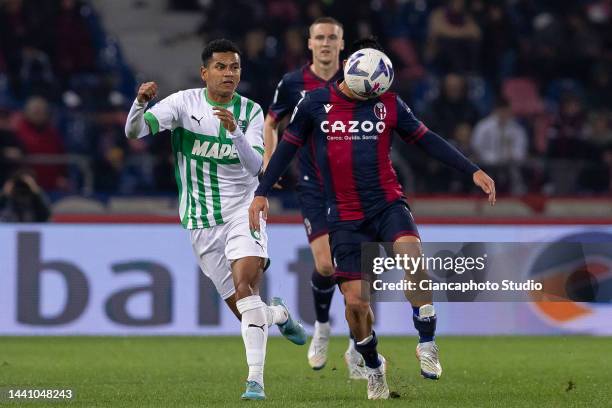 Gary Medel of Bologna FC competes for the ball with Rogerio of US Sassuolo during the Serie A match between Bologna FC and US Sassuolo at Stadio...