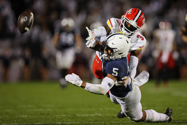 Deonte Banks of the Maryland Terrapins is called for pass interference against Mitchell Tinsley of the Penn State Nittany Lions