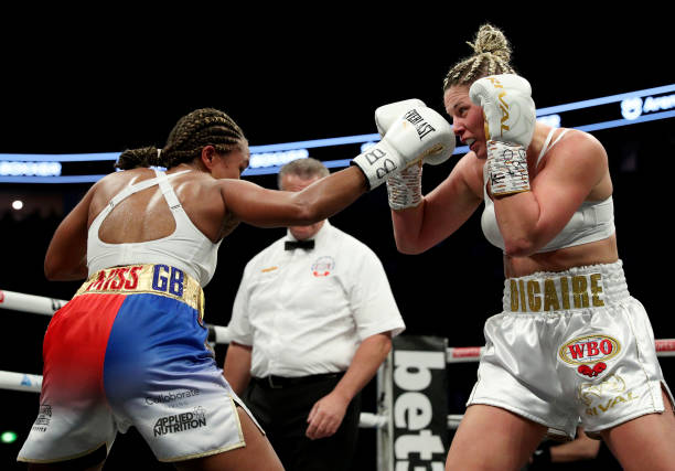 Natasha Jonas punches Marie-Eve Dicaire during the WBC, WBO, IBF World Super-weight championship fight on the Boxxer fight night at Manchester Arena...
