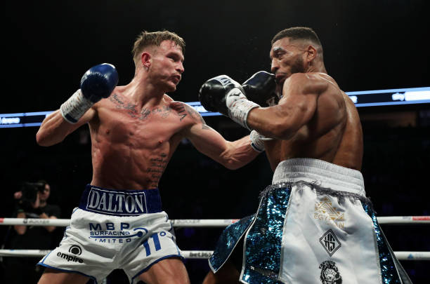 Dalton Smith punches Kaisee Benjamin during the British Super-lightweight championship fight on the Boxxer fight night at Manchester Arena on...