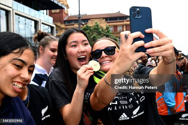 Renee Holmes of the Black Ferns celebrates with fans during the New Zealand Black Ferns Rugby World Cup 2021 fan reception after beating England to...