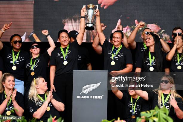 Kennedy Simon and Ruahei Demant of the Black Ferns lift the Rugby World Cup trophy during the New Zealand Black Ferns Rugby World Cup 2021 fan...