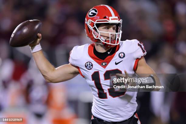 Stetson Bennett of the Georgia Bulldogs throws the ball during the first half of the game against the Mississippi State Bulldogs at Davis Wade...