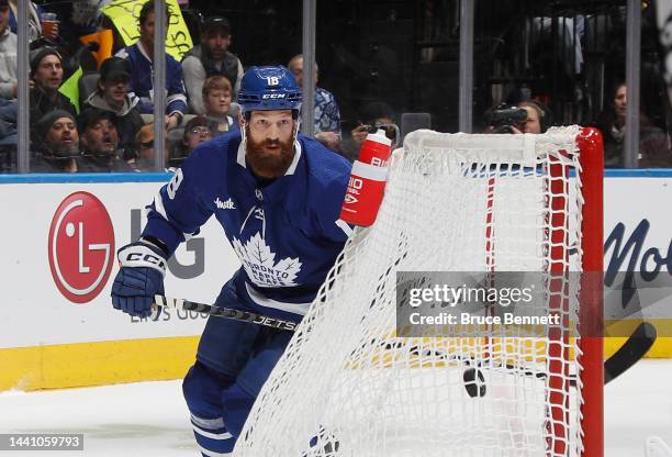 Jordie Benn of the Toronto Maple Leafs scores his first goal as a Leaf against the Vancouver Canucks during the second period at the Scotiabank Arena...