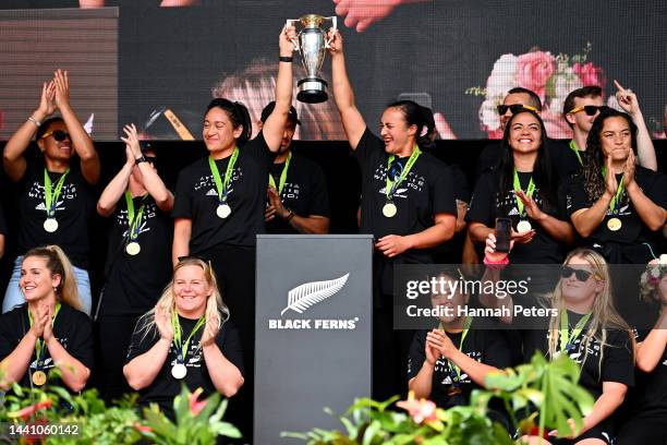 Kennedy Simon and Ruahei Demant of the Black Ferns lift the Rugby World Cup trophy during the New Zealand Black Ferns Rugby World Cup 2021 fan...