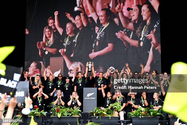 Kennedy Simon and Ruahei Demant of the Black Ferns lift the Rugby World Cup trophy during the New Zealand Black Ferns Rugby World Cup 2021 fan...