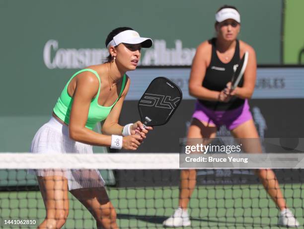 Parris Todd stands at the non volley zone as Lauren Stratman awaits a serve from Mary Brascia and Maggie Brascia in the first round of the Pro Womens...