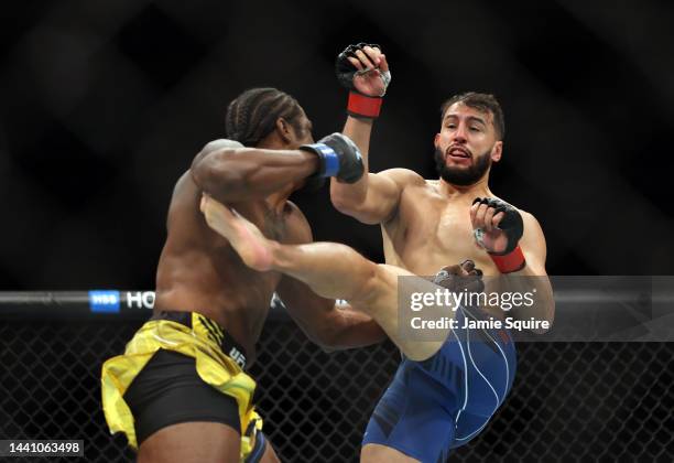 Ryan Spann battles Dominick Reyes in the 1st round of their fight during UFC 281 at Madison Square Garden on November 12, 2022 in New York City.